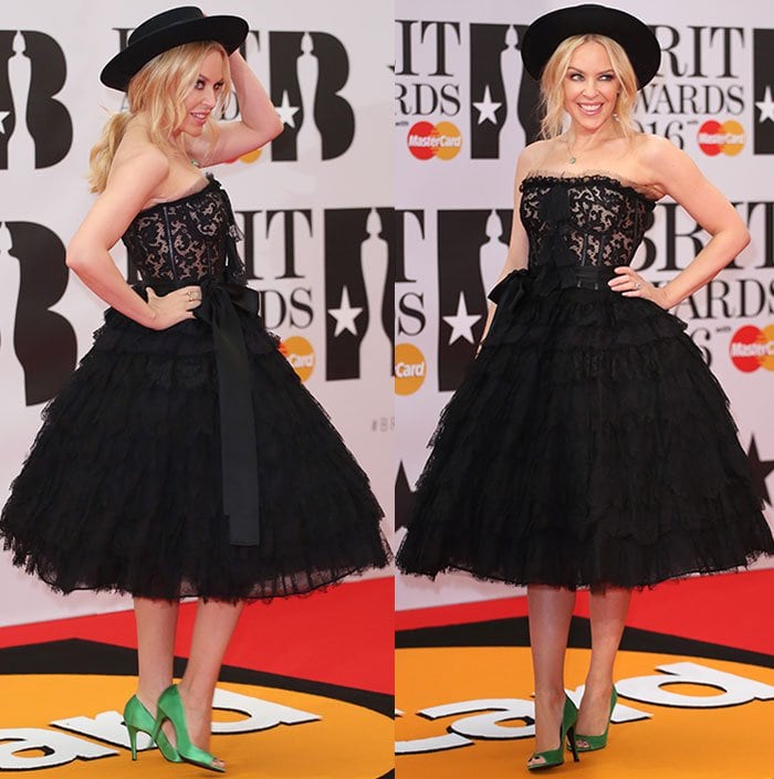 Kylie Minogue wears a black tiered Dolce & Gabbana dress at the BRIT Awards