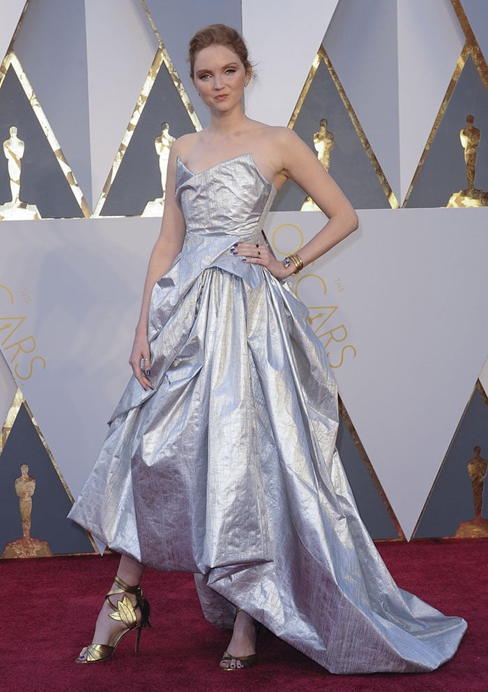 Lily Cole wears a silver Vivienne Westwood dress made from recycled plastic bottles
