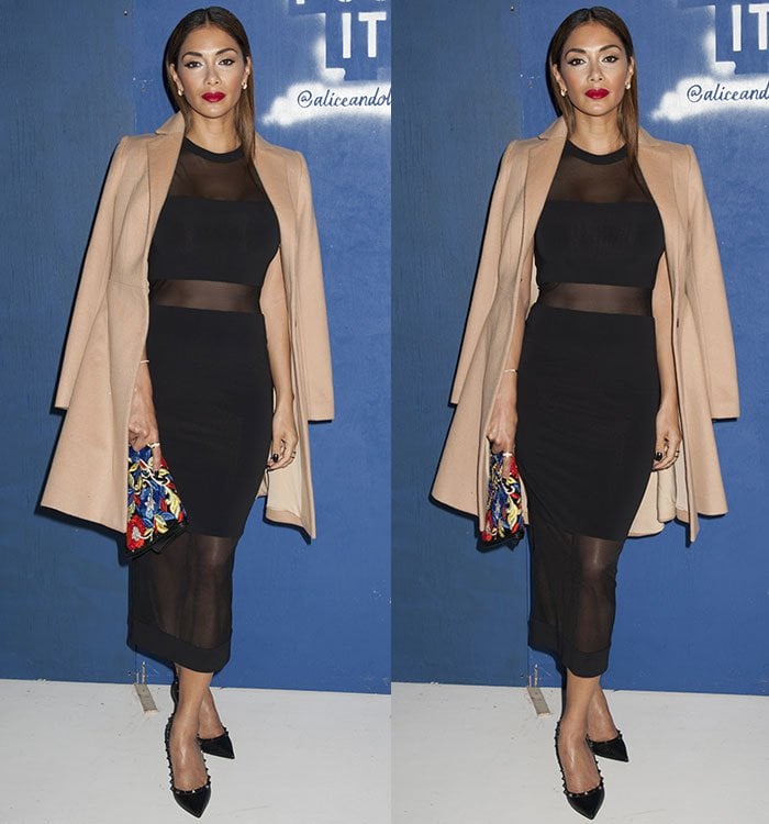 Nicole Scherzinger wears a black-and-sheer midi mesh-trim dress featuring jewel neckline with strapless illusion