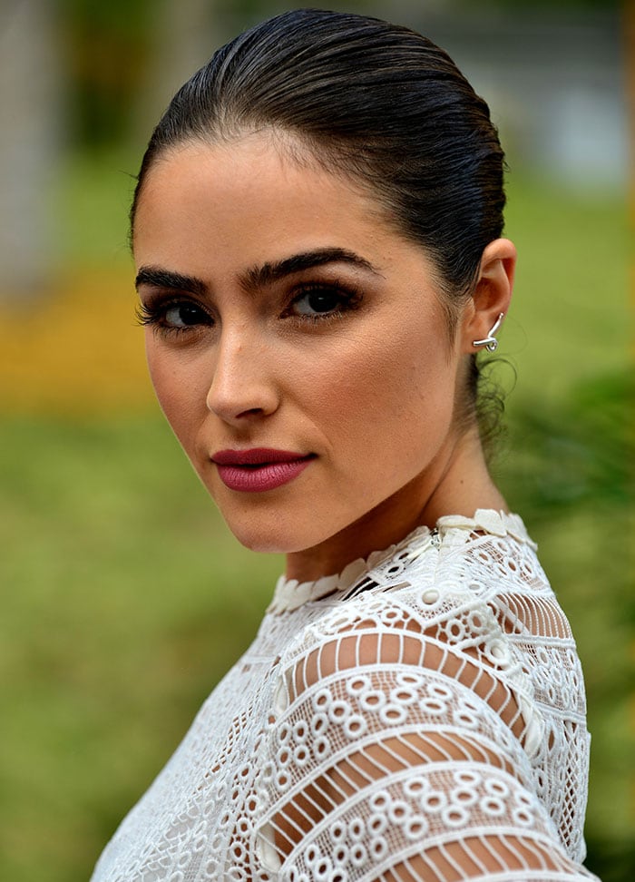 Olivia Culpo wears her hair back at Veuve Clicquot's second annual Clicquot Carnival