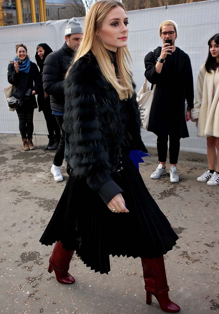 Olivia Palermo wears a Boden Icons Collection top with an Antonio Berardi skirt and belt to London Fashion Week