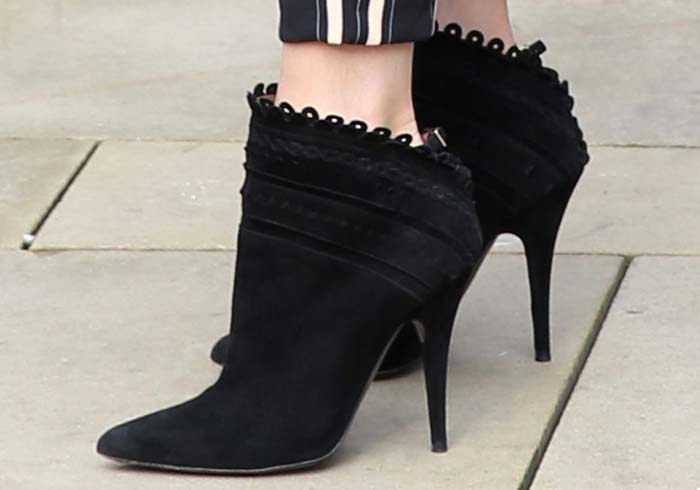 Olivia Palermo completes her London Fashion Week look with stylish black Tabitha Simmons 'Harmony' boots featuring scalloped detailing