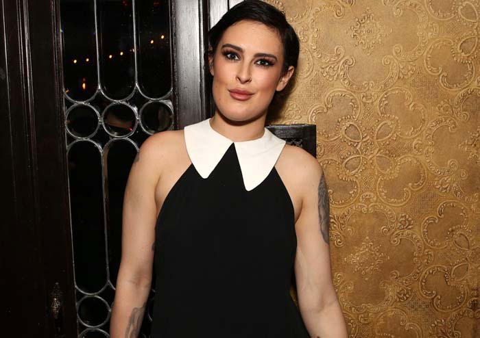 Rumer Willis flaunts her tattoos in a sleeveless Peter Pan-collared dress