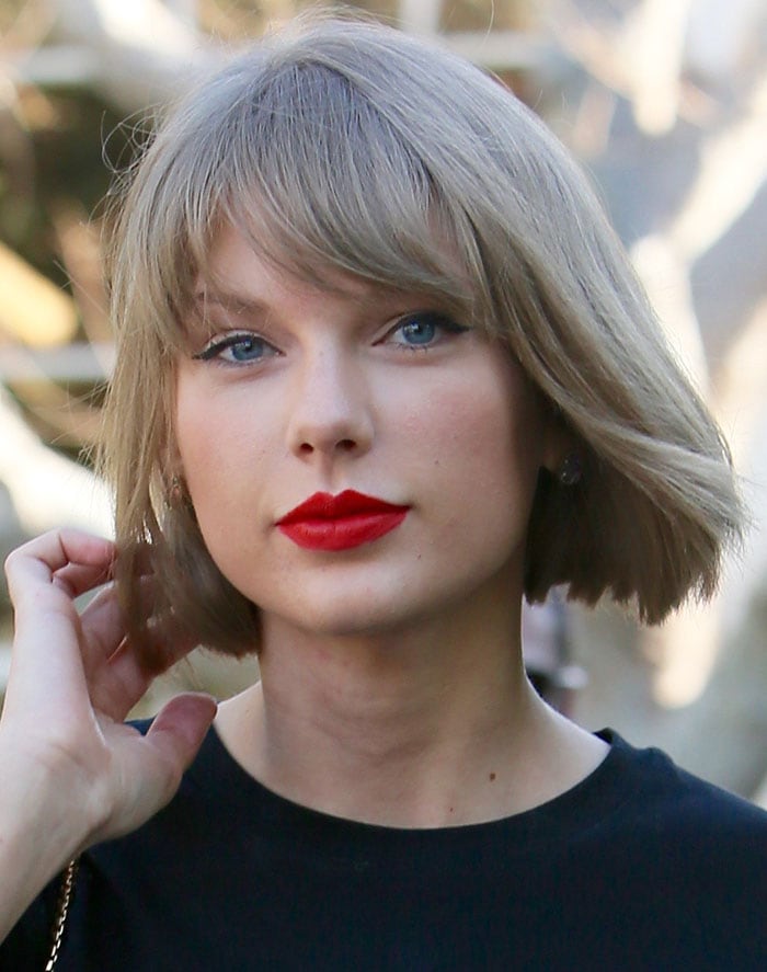 Taylor Swift's short bob hairstyle and red lipstick