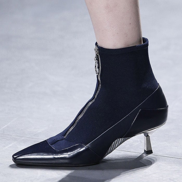 Gigi Hadid Suffers Nip Slip as she Models Versace Pump-Boots