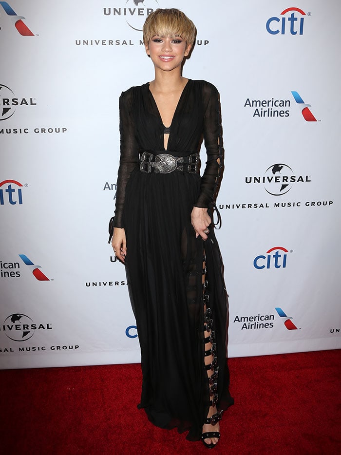 Zendaya wears a floor-length black chiffon dress from Fausto Puglisi on the red carpet
