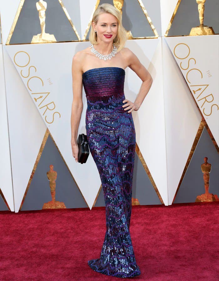 Naomi Watts in a sequined strapless navy gown by Armani Prive at the 88th Annual Academy Awards