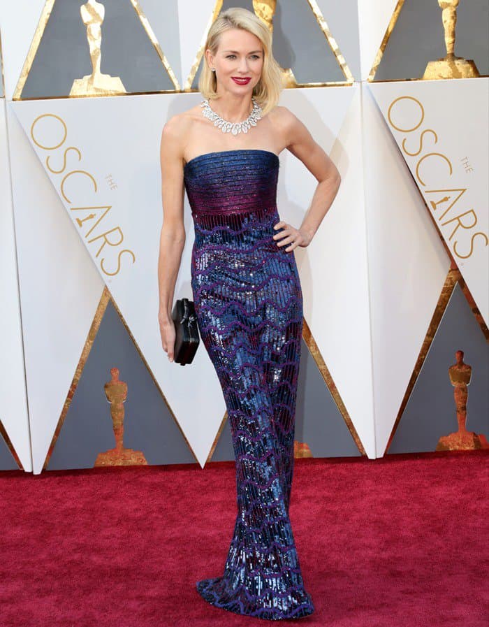 Naomi Watts in a sequined strapless navy gown by Armani Privè at the 88th Annual Academy Awards