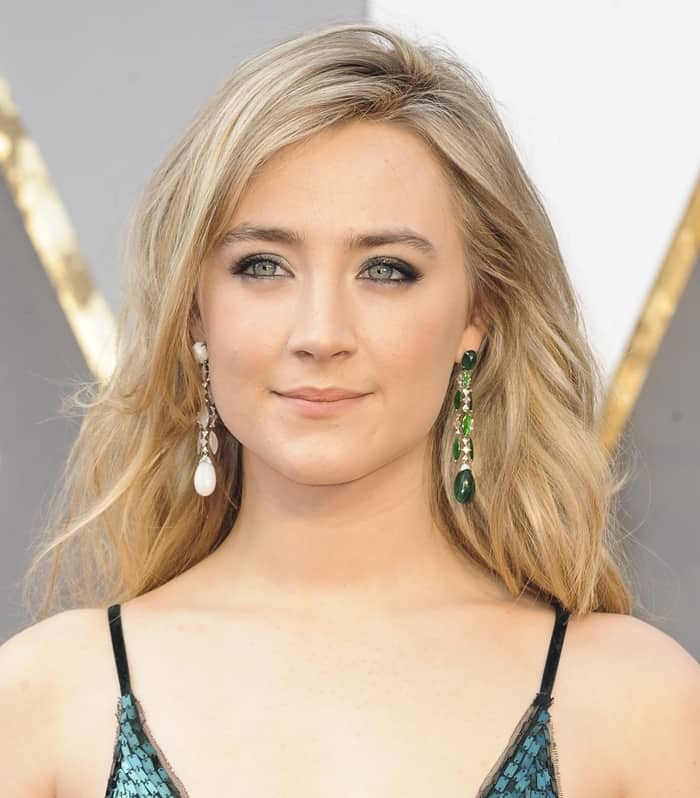 Saoirse Ronan wears two different Chopard earrings on the red carpet