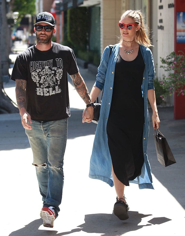 Adam Levine and Behati Prinsloo hold hands during a shopping trip in Beverly Hills