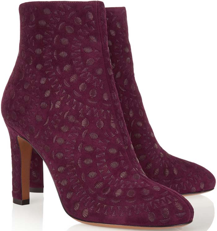 Crafted from rich merlot suede, Alaïa's Italian-made ankle boots are embroidered with a floral medallion motif