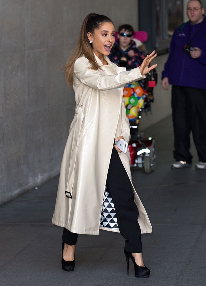 Ariana Grande wears her hair in her signature ponytail outside the BBC Radio 1 studios