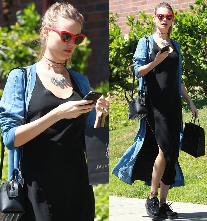 Behati Prinsloo wears her hair back as she shops in Beverly Hills