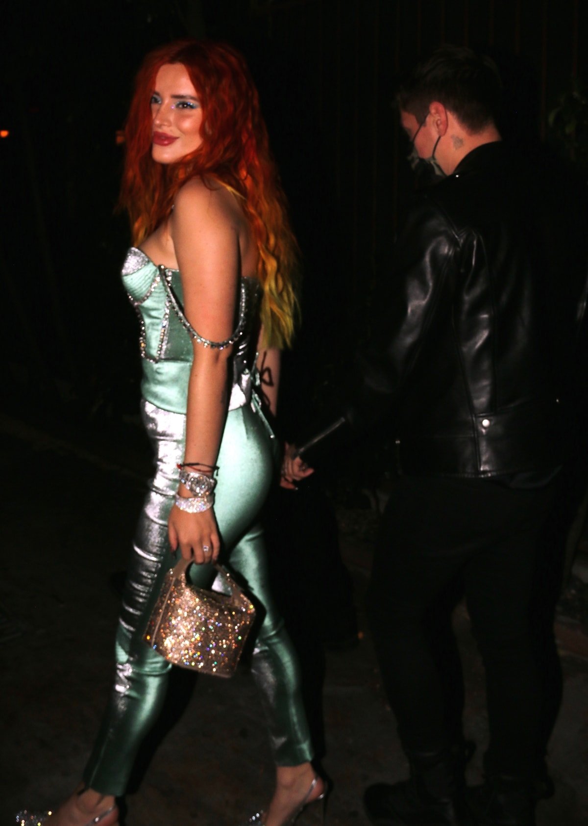 Wearing a mint green crystal stitched corset top and matching pants, Bella Thorne was joined for dinner by her boyfriend Benjamin Mascolo