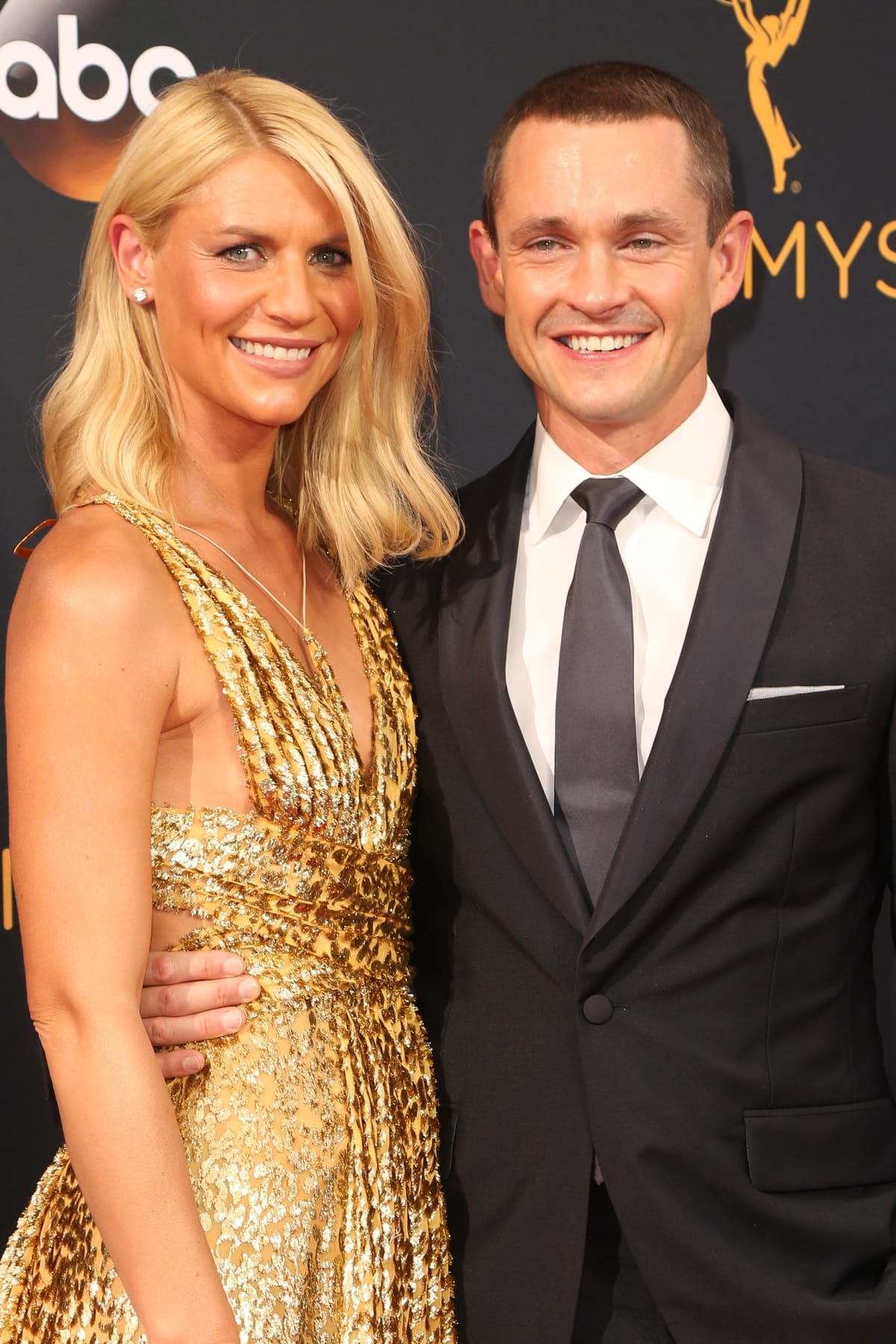 Claire Danes in a glittering Schiaparelli Haute Couture gown with her husband Hugh Dancy