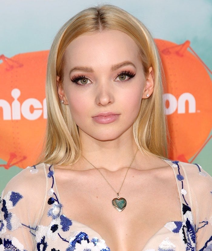 Dove Cameron drew attention to her ample cleavage by wearing a heart-shaped pendant necklace
