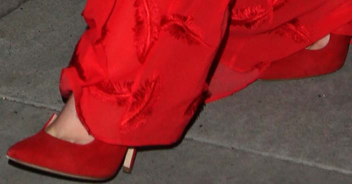 Elizabeth Olsen went monochromatic by pairing her red Emilio Pucci with a red pair of Paul Andrew "Zenadia" pumps
