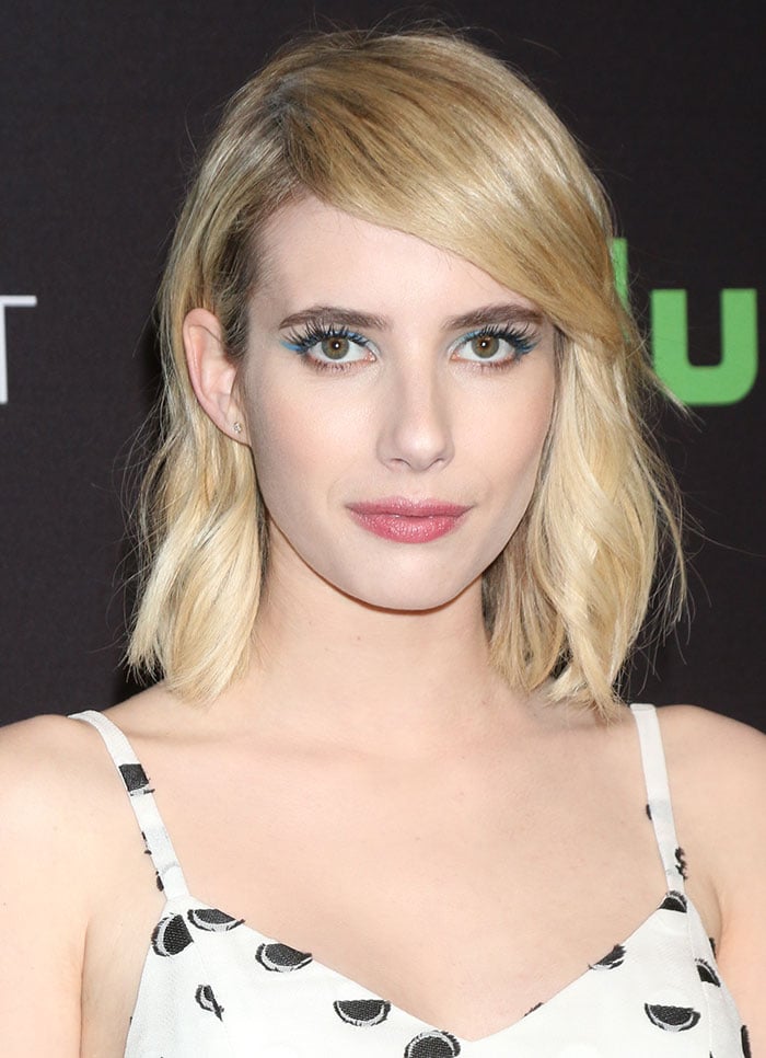 Emma Roberts wears her blonde hair down at the "Scream Queens" panel held March 12, 2016, during the 33rd Annual PaleyFest Los Angeles