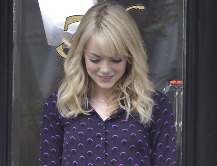 Emma Stone wears her blonde hair down on the set of "The Amazing Spider-Man 2"