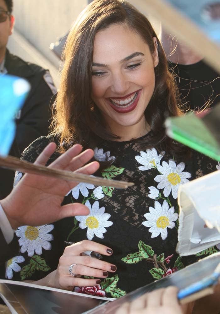 Gal Gadot signs autographs for fans while leaving ABC Studios