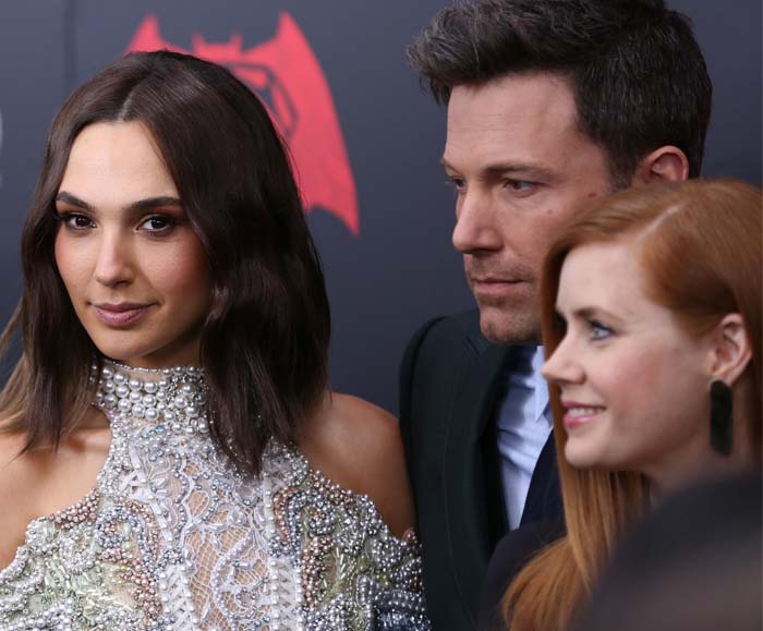 Gal Gadot poses on the red carpet with her co-stars Amy Adams and Ben Affleck, who play Lois Lane and Batman