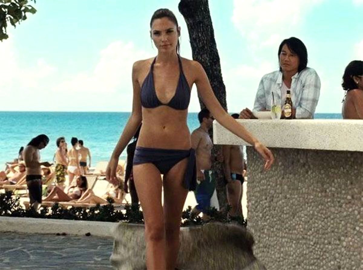 Gal Gadot flaunts her body in a bikini as former Mossad agent Gisele Yashar in the 2011 American heist action film Fast Five