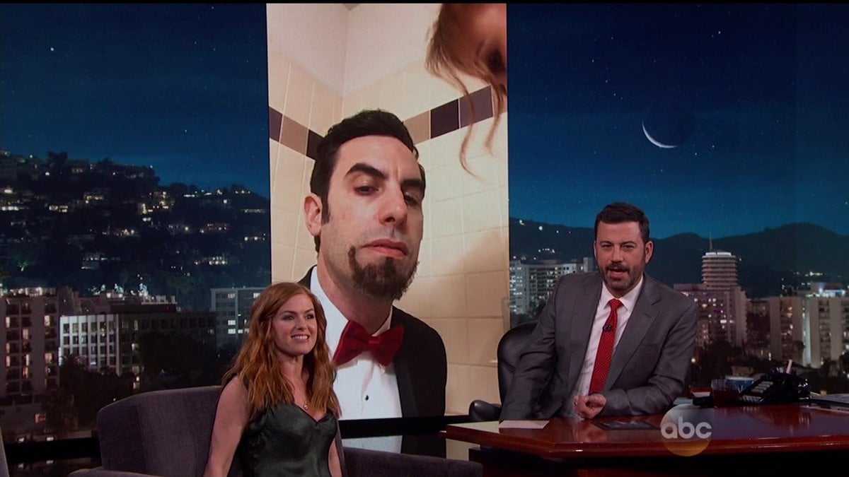 Isla Fisher told Jimmy Kimmel about sneaking Sacha Baron Cohen's Ali G costume into the Oscars