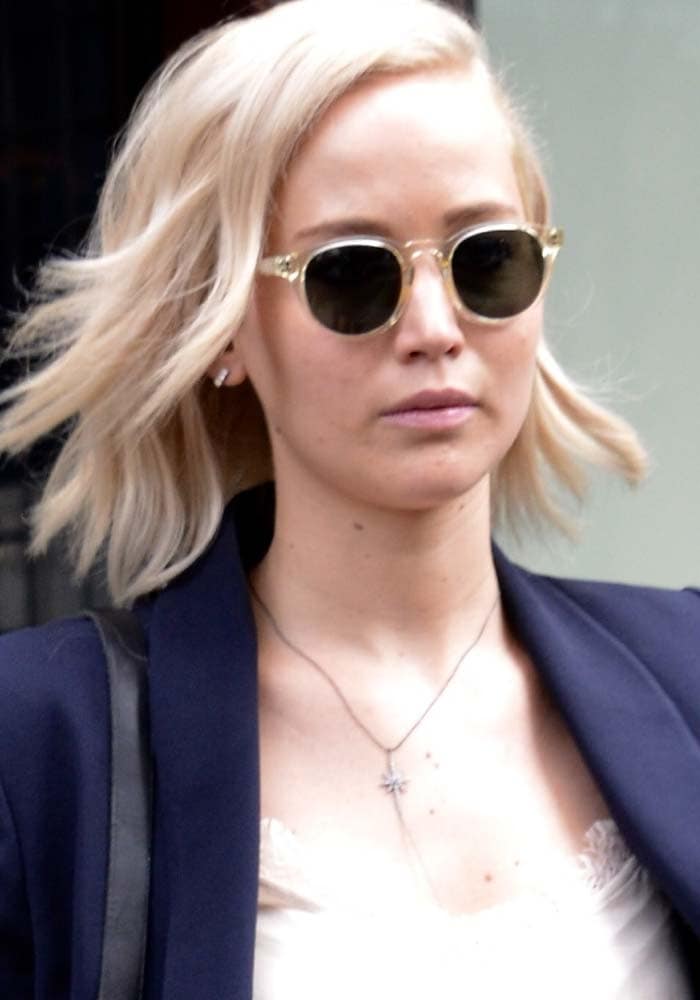 Jennifer Lawrence wears her hair down as she leaves her New York hotel