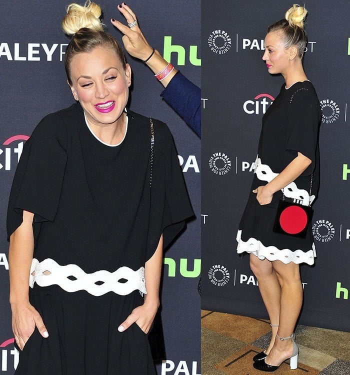 Kaley Cuoco laughs as a hand touches her blonde hair at PaleyFest