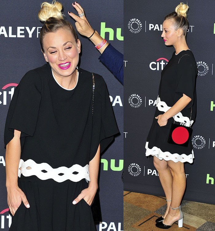 Kaley Cuoco laughs as a hand touches her blonde hair at PaleyFest