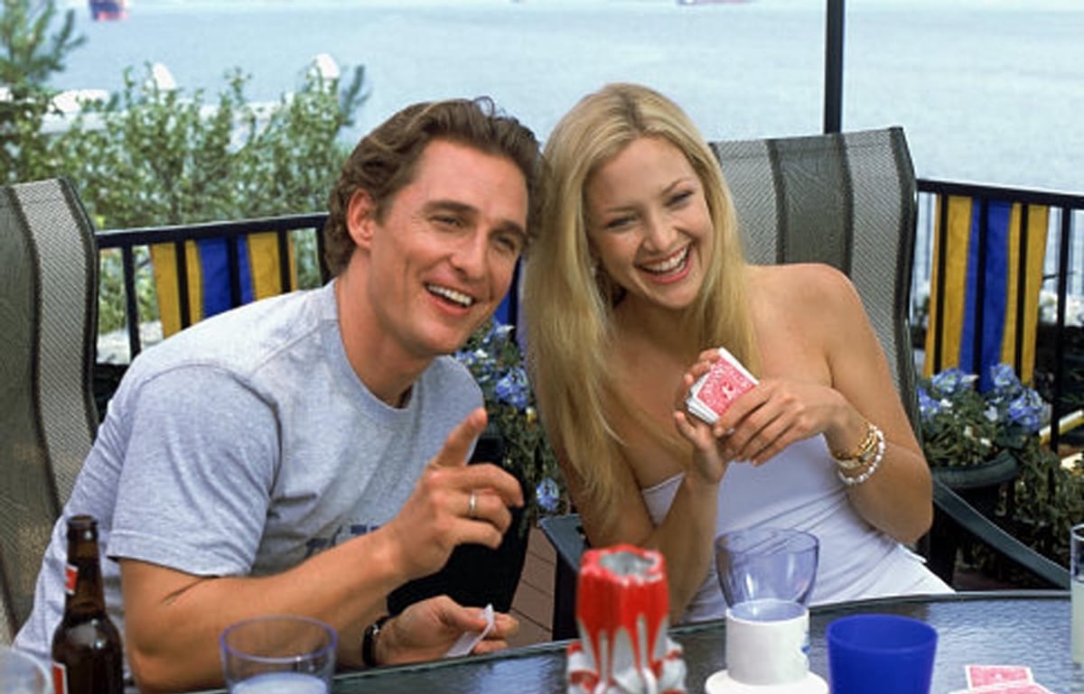 Kate Hudson and Matthew McConaughey share a lighthearted moment in How to Lose a Guy in 10 Days, perfectly capturing their on-screen chemistry