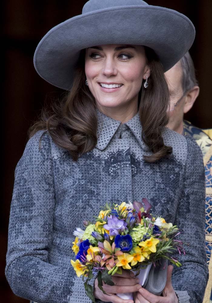 Kate Middleton tops her hair with a hat as she attends a service with the royal family at Westminster Abbey