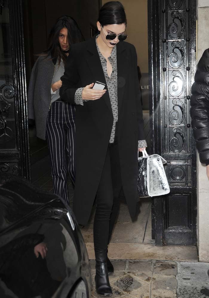 Kendall Jenner leaves Paris Fashion Week in a TY-LR coat and black jeans