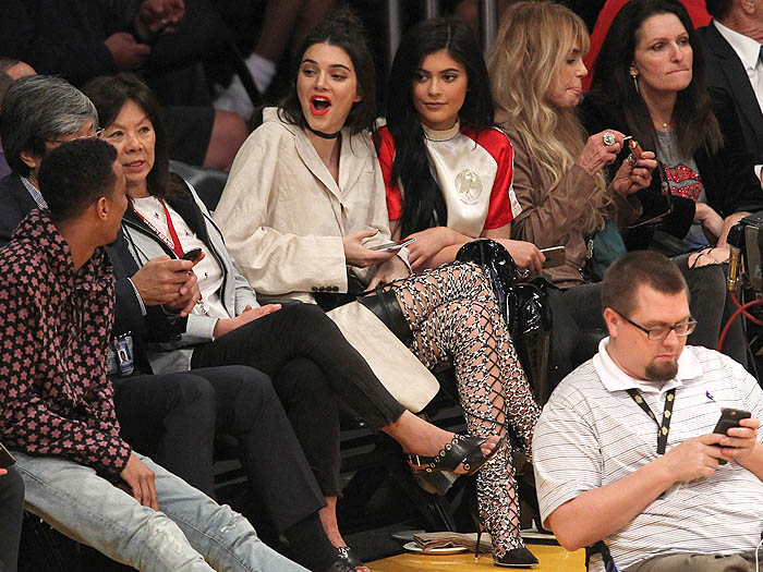 Kylie Jenner wore a red-and-white Opening Ceremony bonsai-embroidered silk-satin dress