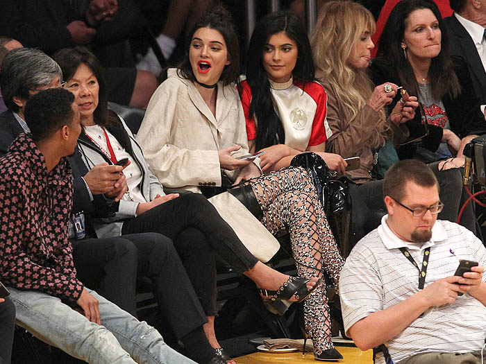 Kylie Jenner wore a red-and-white Opening Ceremony bonsai-embroidered silk-satin dress