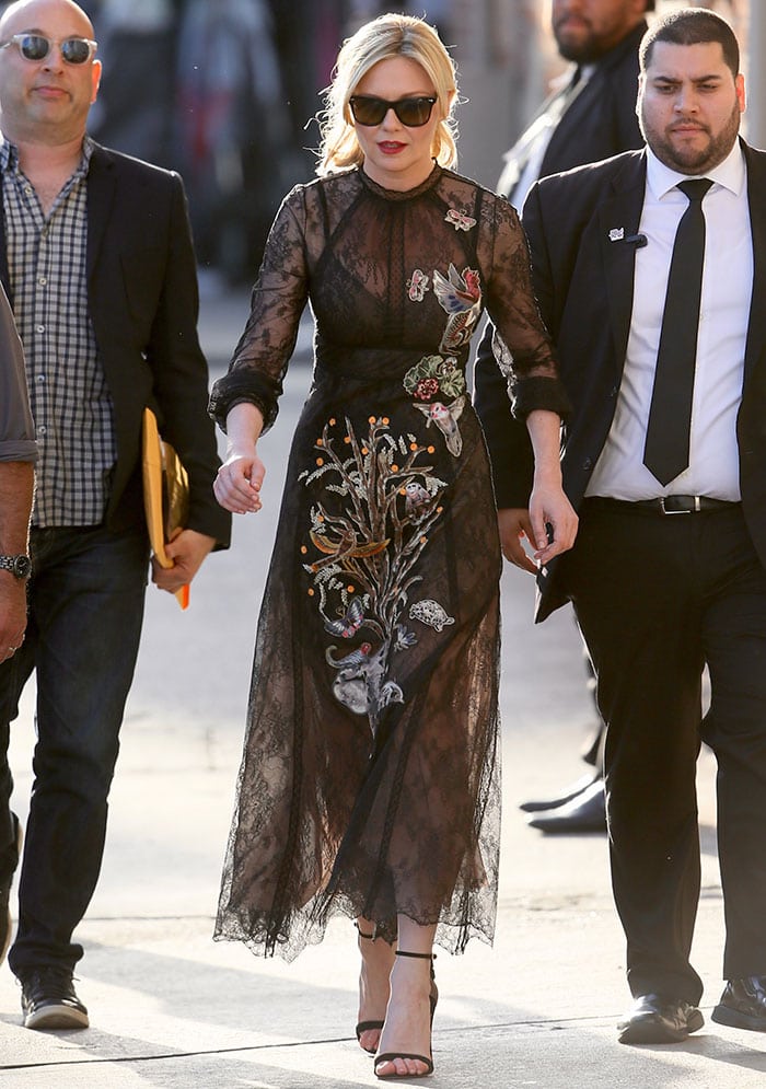 Kirsten Dunst wears a black lace Valentino dress to an appearance on "Jimmy Kimmel Live!"