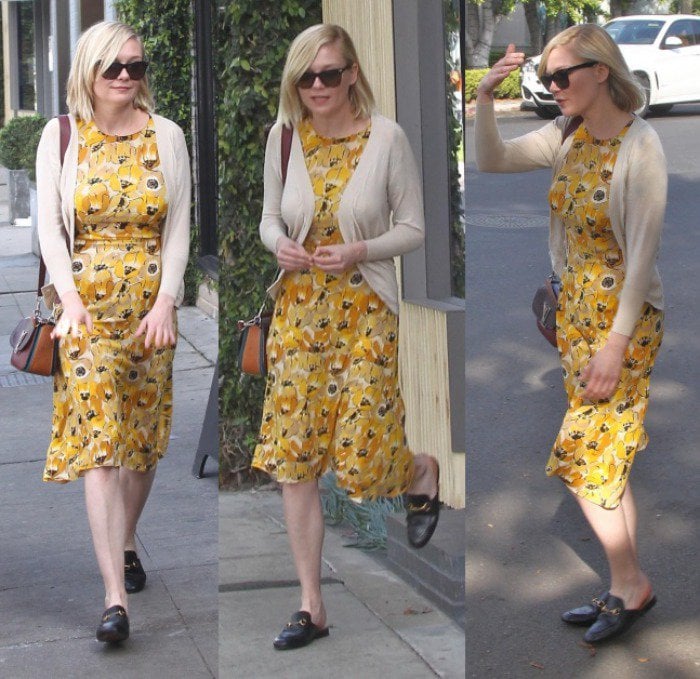 Kirsten Dunst wears a Prada dress and backless loafers out for coffee
