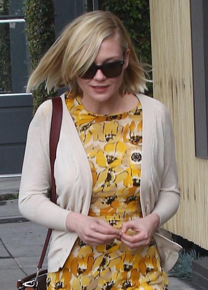 Kirsten Dunst wears her blonde hair down as she steps out in West Hollywood