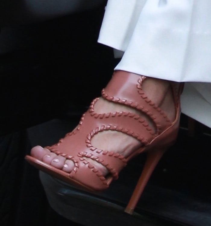 Kourtney Kardashian's feet in blush leather Alaia sandals