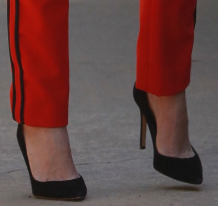 Kourtney Kardashian's feet in black suede Gianvito Rossi heels