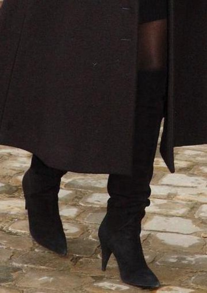 Kris Jenner rocks black thigh-high boots in Paris