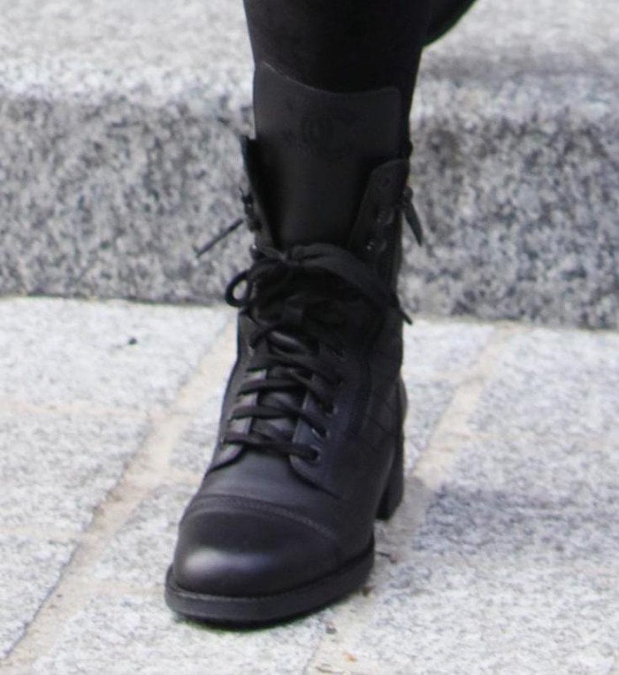 Kris Jenner wears classic Chanel combat boots in Paris