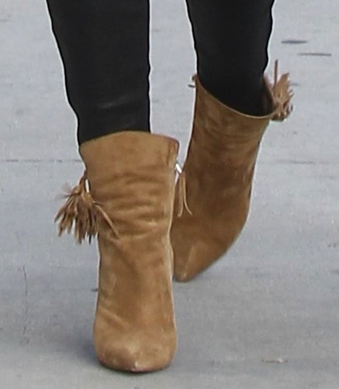 Lily Aldridge's feet in tassel-embellished "Leyton" boots