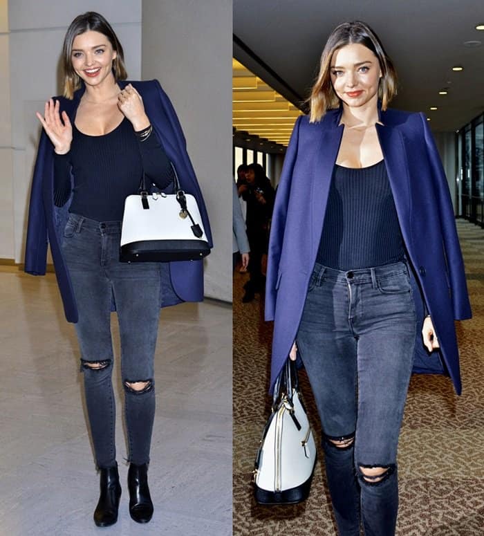 Miranda Kerr effortlessly blends sophistication and edge in a navy blazer, Frame Le Rip Skinny jeans in Muddy Waters, black ankle boots, and a chic Samantha Thavasa tote as she arrives at Narita Airport in Japan on March 15, 2016