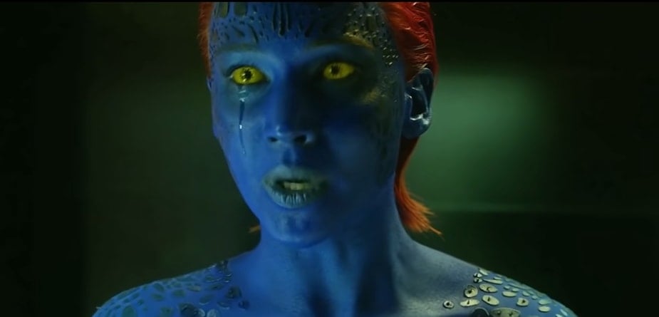 Jennifer Lawrence with blue skin and yellow eyes as Mystique