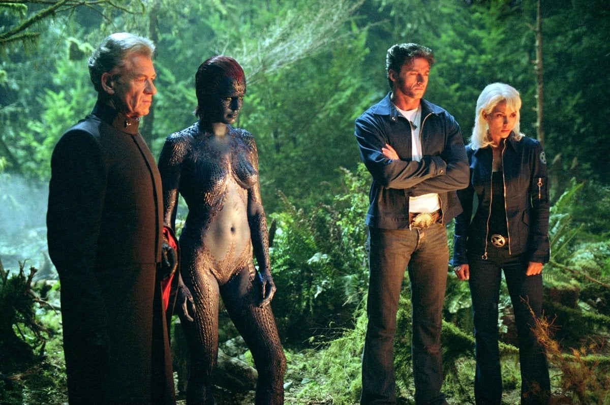 Ian McKellen as Erik Lehnsherr / Magneto, Rebecca Romijn as Raven Darkholme / Mystique, Hugh Jackman as Logan / Wolverine, and Halle Berry as Ororo Munroe / Storm