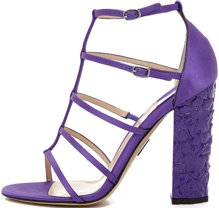 A lacquered heel with floral detailing gives a stunning look to these satin Paul Andrew sandals