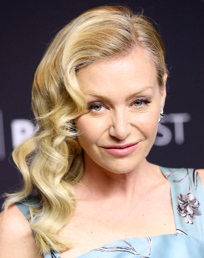 Portia de Rossi sweeps her hair to the side for the "Scandal" panel held during the 33rd annual PaleyFest Los Angeles