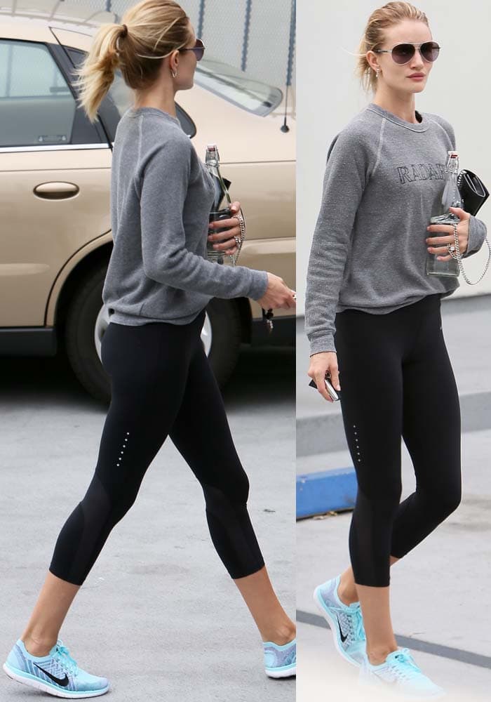 Rosie Huntington-Whiteley leaves the gym in Nike leggings and a Rodarte sweatshirt