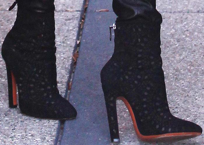 Rosie Huntington-Whiteley slips into her Alaïa boots to get things done for the day